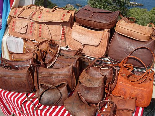 Moroccan Leather Goods Bags And Slippers At Outdoor Market In Marrakesh  Morocco Stock Photo - Download Image Now - iStock